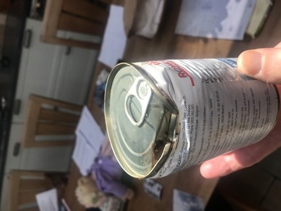 Image for review Damaged cans